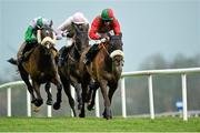 27 December 2013; Benefficient, right, with Bryan Cooper up, races ahead of Arvika Ligeonniere, centre, with Ruby walsh up, and Hidden Cyclone, left, with Andrew McNamara up, on their way to winning the Paddy Power Dial-a-Bet Steeplechase. Leopardstown Christmas Racing Festival 2013, Leopardstown Racetrack, Leopardstown, Co. Dublin. Picture credit: Barry Cregg / SPORTSFILE