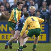 20 March 2005; Colm McFadden, Dublin, in action against Michael Hegarty, left, and Eamonn McGee, Donegal. Allianz National Football League, Division 1A, Dublin v Donegal, Parnell Park, Dublin. Picture credit; Brian Lawless / SPORTSFILE