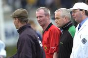 20 March 2005; Referee Michael Ryan looks on at Donegal manager Brian McEniff, left, as he leaves the pitch after the match. Allianz National Football League, Division 1A, Dublin v Donegal, Parnell Park, Dublin. Picture credit; David Levingstone / SPORTSFILE
