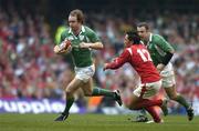 19 March 2005; Denis Hickie, Ireland, races clear of Gavin Henson, Wales. RBS Six Nations Championship 2005, Wales v Ireland, Millennium Stadium, Cardiff, Wales. Picture credit; Brendan Moran / SPORTSFILE