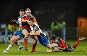 27 December 2013; Matt Healy, Connacht is tackled by Johne Murphy, left, and James Downey, Munster. Celtic League 2013/14, Round 11, Munster v Connacht, Thomond Park, Limerick. Picture credit: Diarmuid Greene / SPORTSFILE