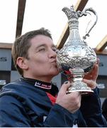 28 December 2013; Jockey Barry Geraghty with the Lexus Steeplechase Trophy after victory on board his mount Bobs Worth. Leopardstown Christmas Racing Festival 2013, Leopardstown Racetrack, Leopardstown, Co. Dublin. Picture credit: Matt Browne / SPORTSFILE