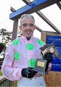 28 December 2013; Jockey Ruby Walsh pictured with the trophy after winning The woodiesdiy.com Christmas Hurdle on Zaidpour. Leopardstown Christmas Racing Festival 2013, Leopardstown Racetrack, Leopardstown, Co. Dublin. Picture credit: Barry Cregg / SPORTSFILE