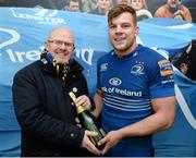 28 December 2013; Jordi Murphy, Leinster, is presented with the award for Most Valued Player award sponsored by Volkswagen after the game by Tom Fleming, Director of Human Resources, Volkswagen Group Ireland. Celtic League 2013/14, Round 11. Leinster v Ulster, RDS, Ballsbridge, Dublin. Picture credit: Stephen McCarthy / SPORTSFILE