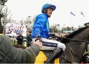 29 December 2013; Ruby Walsh is congratulated by a fan after winning The Ryanair Hurdle on Hurricane Fly. Leopardstown Christmas Racing Festival 2013, Leopardstown Racetrack, Leopardstown, Co. Dublin. Picture credit: Ramsey Cardy / SPORTSFILE