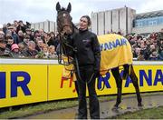 29 December 2013; Gail Carlisle, groom to Hurricane Fly, after winning The Ryanair Hurdle. Leopardstown Christmas Racing Festival 2013, Leopardstown Racetrack, Leopardstown, Co. Dublin. Picture credit: Ramsey Cardy / SPORTSFILE