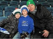 28 December 2013; Leinster fans, from left, James, age 7, Fintan, age 8, and Michael Cranny, from Carrickmines Co. Dublin, ahead of the match. Celtic League 2013/14, Round 11. Leinster v Ulster, RDS, Ballsbridge, Dublin. Picture credit: Piaras Ó Mídheach / SPORTSFILE
