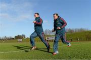 30 December 2013; Munster's Damien Varley trains separate from team-mates with head of physiotherapy Anthony Coole during squad training ahead of their Celtic League game against Ulster on Friday. Munster Rugby Squad Training, University of Limerick, Limerick. Picture credit: Diarmuid Greene / SPORTSFILE