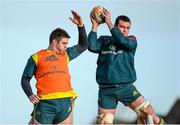 30 December 2013; Munster's Peter O'Mahony wins possession in a lineout ahead of team-mate Billy Holland during squad training ahead of their Celtic League game against Ulster on Friday. Munster Rugby Squad Training, University of Limerick, Limerick. Picture credit: Diarmuid Greene / SPORTSFILE