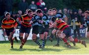 16 January 1999; Anthony Foley, Shannon, is about to be tackled by Colin McEntee, left and Gabriel Fulcher, Lansdowne. AIB League Rugby, Shannon v Lansdowne, Clanwilliam RFC, Tipperary. Picture credit: Brendan Moran / SPORTSFILE