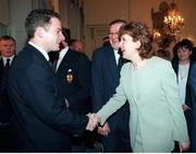 29 January 1999; The President, Mary McAleese accompanied  by IRFU President, Noel Murphy, greets Ulster captain David Humphreys during a visit by both Heineken European Cup Final Teams to Áras an Uachtaráin. Picture credit: Ray McManus / SPORTSFILE