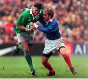 6 February 1999; Dion O'Cuinneagain, Ireland, is tackled by Philippe Bernat-Salles, France. Five Nations Rugby Championship, Ireland v France, Lansdowne Road, Dublin. Picture credit: Brendan Moran / SPORTSFILE
