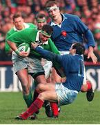 6 February 1999; Dion O'Cuinneagain, Ireland, is tackled by Thomas Castaignede, France.  Five Nations Rugby Championship, Ireland v France, Lansdowne Road, Dublin. Picture credit: Brendan Moran / SPORTSFILE