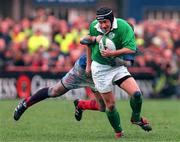 6 February 1999; David Humphreys, Ireland, is tackled by Olivier Magne, France. Five Nations Rugby Championship, Ireland v France, Lansdowne Road, Dublin. Picture credit: Brendan Moran / SPORTSFILE