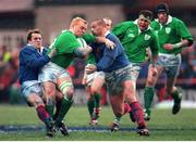 6 February 1999; Rob Henderson, Ireland, is tackled by Thomas Castaignede, left, and Philippe Bennetton, France. Five Nations Rugby Championship, Ireland v France, Lansdowne Road, Dublin. Picture credit: Brendan Moran / SPORTSFILE
