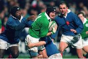 5 February 1999; John McWeeney, Ireland, is tackled by Alessio Galasso, left, and Fabrice Ribeyrolles, France. Representative Match, Ireland A v France A, Donnybrook, Dublin. Picture credit: Matt Browne / SPORTSFILE
