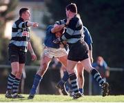 13 February 1999; Trevor Brennan, St Marys, gets to grips with Anthony Foley, Shannon. AIB League Rugby, St. Mary's College v Shannon, Templeville Road, Dublin. Picture credit: Brendan Moran / SPORTSFILE