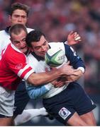 30 January 1999; Stan McDowell, Ulster, is tackled by Jean-Luc Sadourney, Colomiers. Heineken European Cup Final, Ulster v Colomiers, Lansdowne Road, Dublin. Picture credit: Brendan Moran / SPORTSFILE
