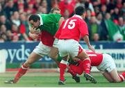 20 February 1999; Conor O'Shea, Ireland, in action against Neil Jenkins, Dafydd James and Shame Howarth, no.15 Wales. Five Nations Rugby Championship, Ireland v Wales, Wembley Stadium, London, England. Picture credit: Brendan Moran / SPORTSFILE