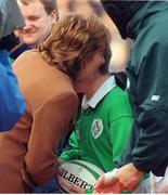 6 March 1999; 12 year old Alastair Hall, a victim of the Omagh bombing, is embraced by President Mary McAleese. Five Nations Rugby Championship, Ireland v England, Lansdowne Road, Dublin. Picture credit: Brendan Moran / SPORTSFILE