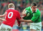 20 February 1999; Ireland 's Justin Bishop is tackled by Wales' Neil Jenkins. Five Nations Rugby Championship, Ireland v Wales, Wembley Stadium, London, England. Picture credit: Matt Browne / SPORTSFILE