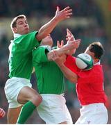 20 February 1999; Justin Bishop (left) and Jonathan Bell, Ireland in action against Scott Gibbs, Wales. Five Nations Rugby Championship, Ireland v Wales, Wembley Stadium, London, England. Picture credit: Brendan Moran / SPORTSFILE