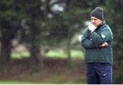 3 March 1999; Ireland rugby coach Warren Gatland watches his players in the rain during training. Ireland Rugby Squad Training, Dr. Hickey Park, Greystones, Co. Wicklow. Picture credit: Brendan Moran / SPORTSFILE