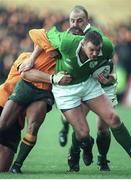 23 November 1999; David Corkery, Ireland, is tackled by George Gregan, Australia. International Rugby Friendly, Ireland v Australia, Lansdowne Road, Dublin. Picture credit: Brendan Moran / SPORTSFILE