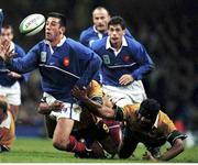 6 November 1999; Arnaud Costes, France, is tackled by George Gregan and Stephen Larkham, Australia. 1999 Rugby World Cup Final, Millennium Stadium, Cardiff, Wales. Picture credit: Matt Browne / SPORTSFILE