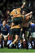6 November 1999; Australian captain John Eales and David Wilson (7) celebrate their victory over France.1999 Rugby World Cup Final, Millennium Stadium, Cardiff, Wales. Picture credit: Matt Browne / SPORTSFILE