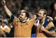 6 November 1999; Australia's Michael Foley, left, and Richard Harry celebrate victory over France. 1999 Rugby World Cup Final, Australia v France, Millennium Stadium, Cardiff, Wales. Picture credit: Matt Browne / SPORTSFILE