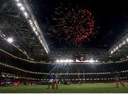 6 November 1999; The French players leave the pitch after being defeated by Australia as fireworks light up the evening sky to signal the end of the 1999 Rugby World Cup. 1999 Rugby World Cup Final, Australia v France, Millennium Stadium, Cardiff, Wales. Picture credit: Brendan Moran / SPORTSFILE