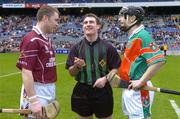 17 March 2005; Athenry captain Eugene Cloonan, left, and James Stephens captain Peter Barry look on as referee Seamus Roche tosses the coin. AIB All-Ireland Club Senior Hurling Championship Final, Athenry v James Stephens, Croke Park, Dublin. Picture credit; Ray McManus / SPORTSFILE