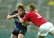 25 March 2005; Shane Byrne, Leinster, is tackled by Andy Powell, Llanelli Scarlets. Celtic League 2004-2005, Leinster v Llanelli Scarlets, Lansdowne Road, Dublin. Picture credit; Brendan Moran / SPORTSFILE