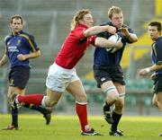 25 March 2005; Eric Miller, Leinster, is tackled by Andy Powell, Llanelli Scarlets. Celtic League 2004-2005, Leinster v Llanelli Scarlets, Lansdowne Road, Dublin. Picture credit; Brendan Moran / SPORTSFILE