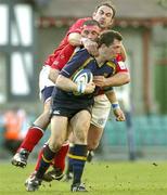 25 March 2005; Guy Easterby, Leinster, is tackled by John Davies and Chris Wyatt, Llanelli Scarlets. Celtic League 2004-2005, Leinster v Llanelli Scarlets, Lansdowne Road, Dublin. Picture credit; Brendan Moran / SPORTSFILE