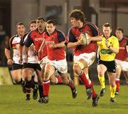 25 March 2005; Donnacha O'Callaghan, Munster, supported by team-mates Jason Holland and Jim Williams, charges forward against the Dragons. Celtic League, Newport Gwent Dragons v Munster, Rodney Parade, Newport, Wales. Picture credit; Tim Parfitt / SPORTSFILE