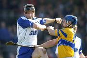 26 March 2005; Tom Feeney, Waterford, in action against Andrew Quinn, Clare. Allianz National Hurling League, Division 1A, Waterford v Clare, Fraher Field, Dungarvan, Co. Waterford. Picture credit; Brendan Moran / SPORTSFILE