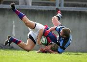 26 March 2005; Niall O'Brien, Clontarf, is tackled by David O'Donovan, Shannon. AIB All Ireland League 2004-2005, Division 1, Shannon v Clontarf, Thomond Park, Limerick. Picture credit; Kieran Clancy / SPORTSFILE
