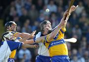 26 March 2005; Niall Gilligan and Tony Carmody, right, Clare, in action against Denis Coffey, left, and Fergal Hartley, Waterford. Allianz National Hurling League, Division 1A, Waterford v Clare, Fraher Field, Dungarvan, Co. Waterford. Picture credit; Brendan Moran / SPORTSFILE