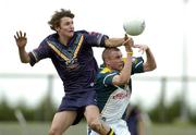 27 March 2005; Declan Brennan, Ireland, in action against Daniel Dzufer, Australia. U-17 International Rules Series, Ireland v Australia, St. Oliver Plunkett Park, Crossmaglen, Co. Armagh.. Picture credit; Brendan Moran / SPORTSFILE