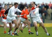 27 March 2005; Paul McCormack, Armagh, in action against Ross Glavin, left, and Killian Brennan, Kildare. Allianz National Football League, Division 1B, Armagh v Kildare, St. Oliver Plunkett Park, Crossmaglen, Co. Armagh.. Picture credit; Brendan Moran / SPORTSFILE
