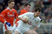 27 March 2005; Michael Foley, Kildare, in action against Justin McNulty and Paul McGrane, left, Armagh. Allianz National Football League, Division 1B, Armagh v Kildare, St. Oliver Plunkett Park, Crossmaglen, Co. Armagh.. Picture credit; Brendan Moran / SPORTSFILE