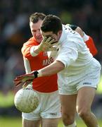 27 March 2005; Andrew McLoughlin, Kildare, in action against Steven McDonnell, Armagh. Allianz National Football League, Division 1B, Armagh v Kildare, St. Oliver Plunkett Park, Crossmaglen, Co. Armagh.. Picture credit; Brendan Moran / SPORTSFILE
