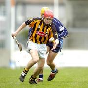 27 March 2005; Tommy Walsh, Kilkenny, in action against David Curtin, Dublin. Allianz National Hurling League, Division 1A, Dublin v Kilkenny, Parnell Park, Dublin. Picture credit; Ciara Lyster / SPORTSFILE
