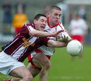 27 March 2005; Philip Jordan, Tyrone, in action against Peter Tormey, Westmeath. Allianz National Football League, Division 1A, Westmeath v Tyrone, Cusack Park, Mullingar, Co. Westmeath. Picture credit; Oliver McVeigh / SPORTSFILE