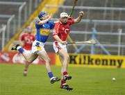 27 March 2005; Kevin Hartnett, Cork, in action against Benny Dunne, Tipperary. Allianz National Hurling League, Division 1B, Tipperary v Cork, Semple Stadium, Thurles, Co. Tipperary. Picture credit; Damien Eagers / SPORTSFILE
