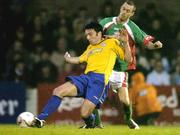 28 March 2005; Stuart Byrne, Shelbourne, in action against George O'Callaghan, Cork City. Setanta Cup, Group 2,  Cork City v Shelbourne, Turners cross, Cork. Picture credit; David Maher / SPORTSFILE