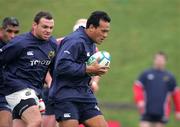 29 March 2005; Brian Lima and Rob Henderson in action during Munster rugby squad training. University of Limerick, Limerick. Picture credit; Kieran Clancy / SPORTSFILE