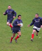 29 March 2005; Brian Lima, centre, Rob Henderson and Jason Holland, left, in action during Munster rugby squad training. University of Limerick, Limerick. Picture credit; Kieran Clancy / SPORTSFILE